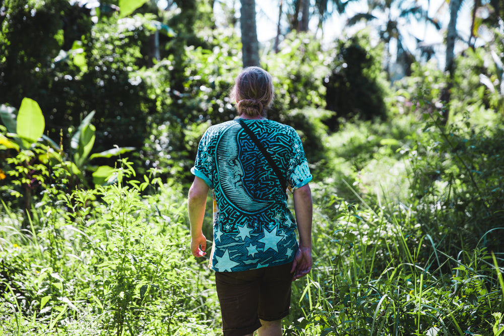 Green t-shirt with The Band graphic